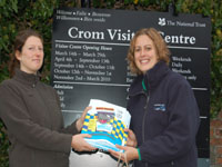 Rebecca Killa from the Crom Estate in Fermanagh r4eceives Hippo Bags from NI Water's Anna Marshall  | NI Water News